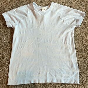 This shirt is from Athleta, size 8/10, this shirt is light blue with camo.